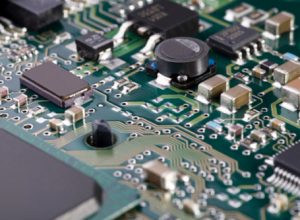 shallow depth-of-field image of green computer circuit board